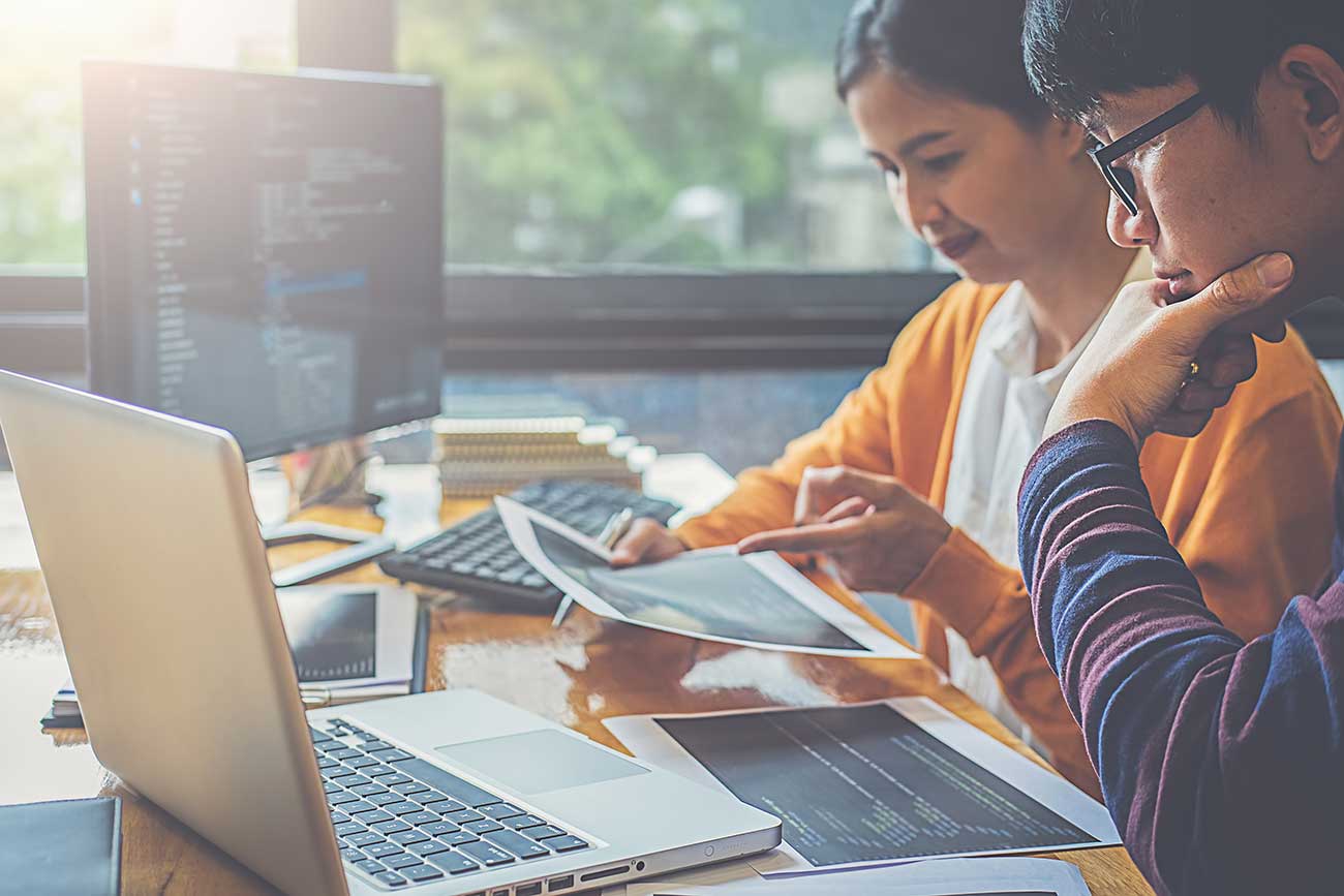 Technology translators prepare software localization documents    
