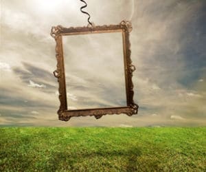Picture frame hanging above a field.